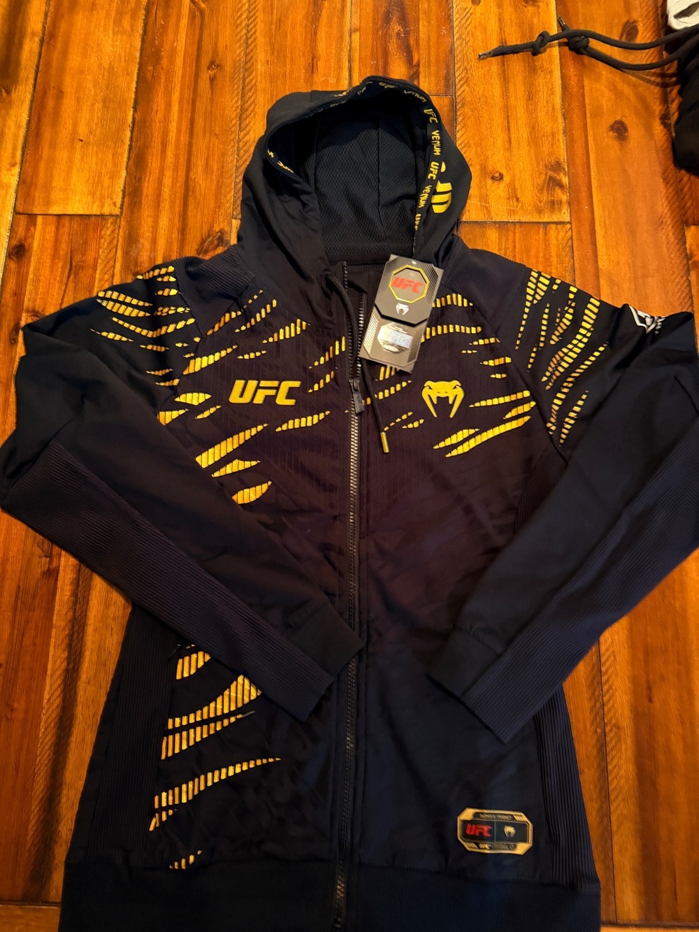 UFC Womens size medium Black and Yellow Hooded Zip Jacket